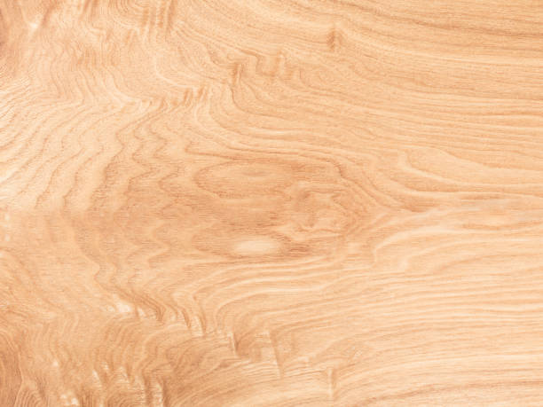 istock Abstract natural contrast background of oak panel in pink color with sinuous texture 1488070633