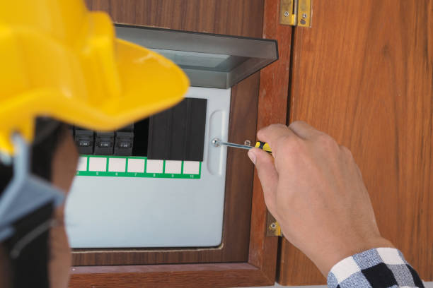 istock The electrician inspector is checking the control chart of the home power switch. 1488070900