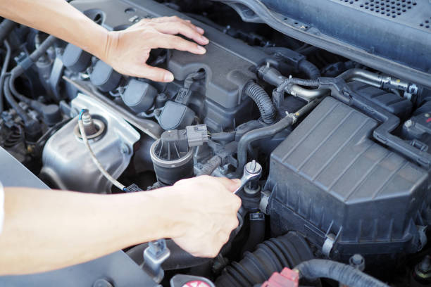 istock The engine engineer is checking and repairing the car. Off-site care services 1488070914