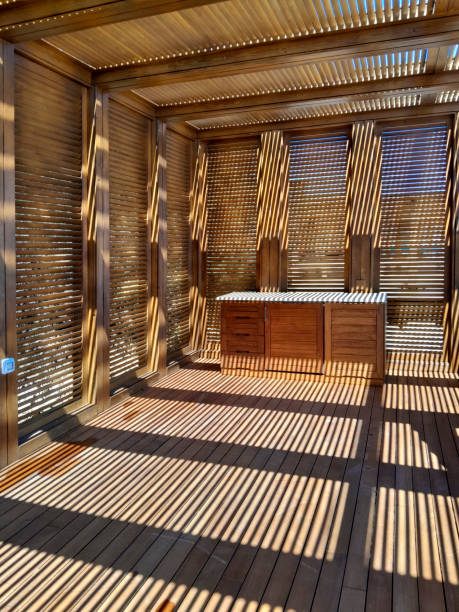 istock harsh shades and wooden cabinet 1488071020