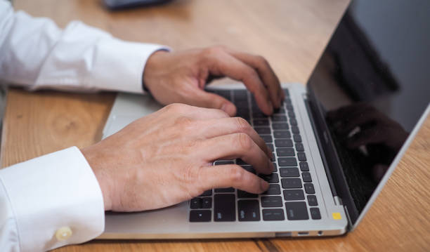 istock Businessmen use the keyboard on the desk. 1488072024