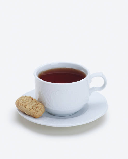 istock Cookies with a cup of tea. on a white background 1488072929