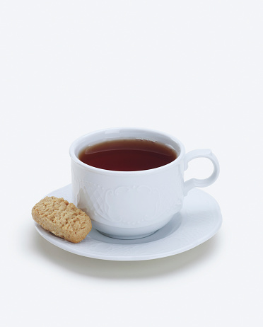 Cookies with a cup of tea. on a white background