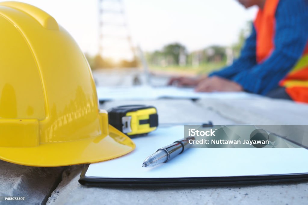 The work of the contractor in the construction area. Hardhat Stock Photo