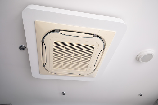 Ceiling Mounted Cassette Type Air Conditioner For Large Rooms.