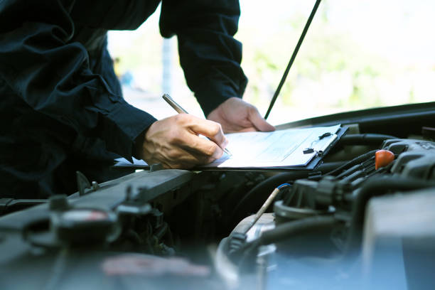istock The engine engineer is checking and repairing the car. Off-site care services 1488074209
