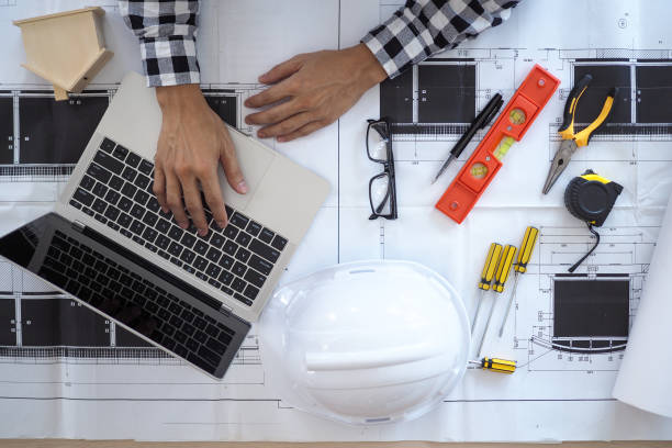 istock The work desk of the project contractor or engineer viewing the building structure plan 1488075409