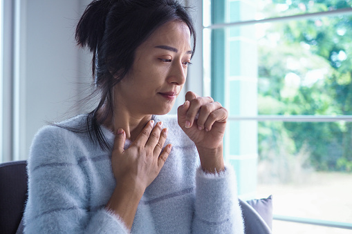 Asian women have angina, high fever and chronic cough. Tuberculosis symptoms