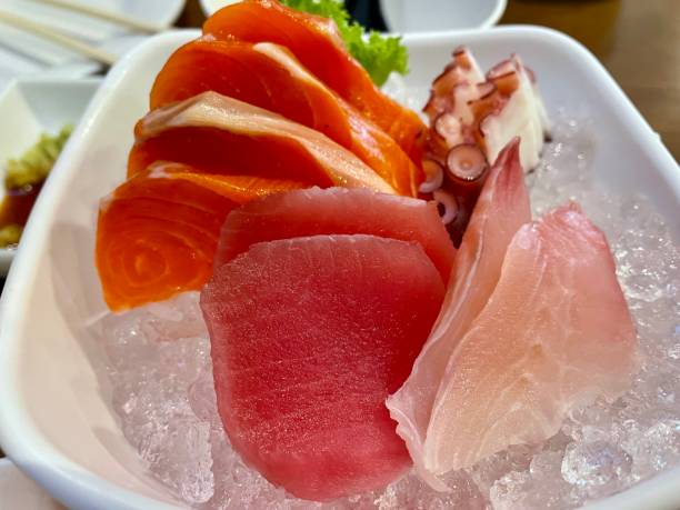 istock Sashimi Japanese set meal. Salmon, fresh squid, octopus tentacles 1488080963