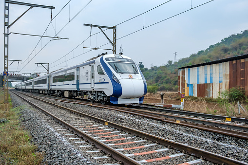 Pune, India - May 07 2023: The Solapur Mumbai Vande Bharat Express Train heading towards Mumbai, shot at Kamshet near Pune India.