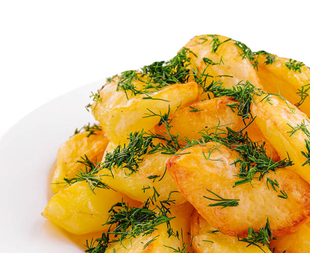 istock Fried potato slices with dill on plate 1488090755