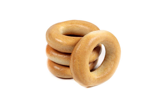 istock Delicious dry bagels isolated on white 1488091508