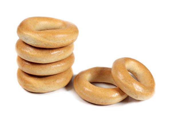 istock Stack of dry bagels isolated on white 1488091556