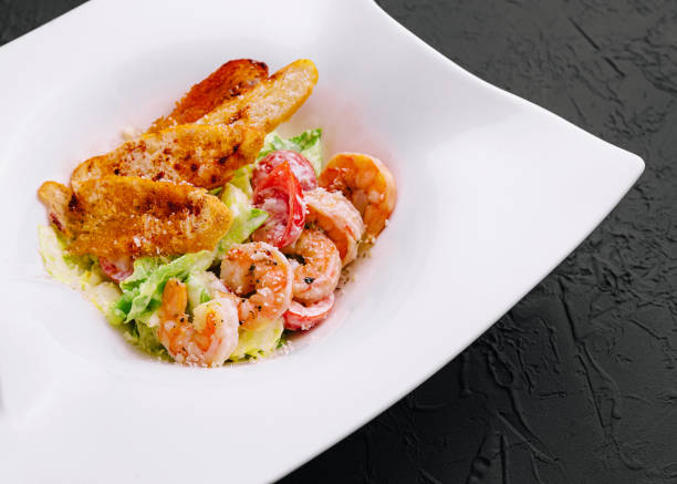 istock lettuce salad with Caesar sauce, tiger prawns, cheese and bread crumbs 1488091719