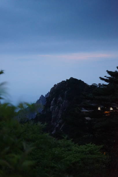 twilight at yellow mountain nightfall huangshan mountains stock pictures, royalty-free photos & images