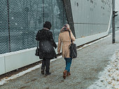 people at the street in snowy winter
