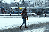 woman at the street in snowy winter