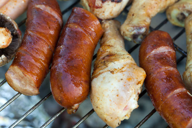 Delicious sausages made of natural meat. Prepared in the lattice in the fire.