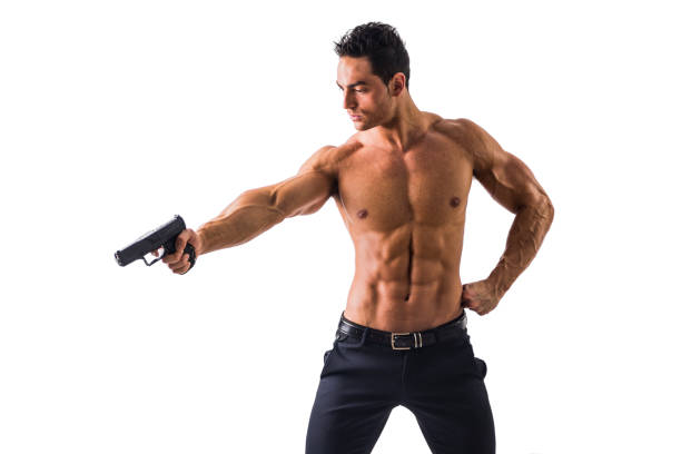 istock Athletic Topless Man Holding Handgun, Isolated on White 1488101411