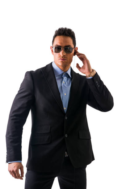 istock Elegant man with earphones, a security staff 1488101690