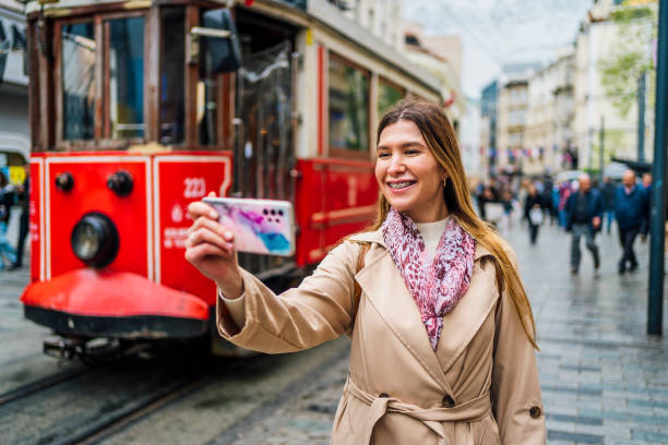 istock Woman taking selfies in Istanbul 1488112873