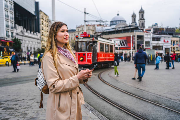 istock Woman using phone in Istanbul 1488112908