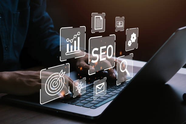 istock SEO,Search Engine Optimization Marketing Ranking Traffic Website Internet Business Technology Concept.Seo Career.Businessman using laptop to analysis SEO. 1488112968
