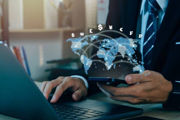 istock Currency exchange, money transfer.Businessman using mobile phone for digital banking, world currency via mobile app.FinTech financial technology, online banking, interbank payment, e-transaction concept. 1488112988