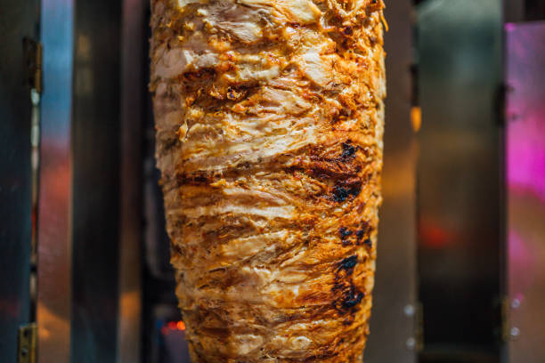 Grilled meat used for making a traditional Turkish food Doner Kebab in a fast food restaurant