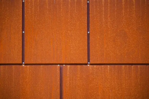 Photo of Detail of modern architecture corten building.