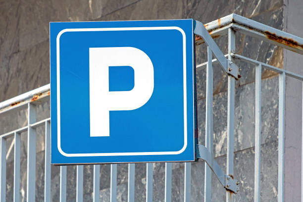 istock Parking sign on metal fence 1488117512