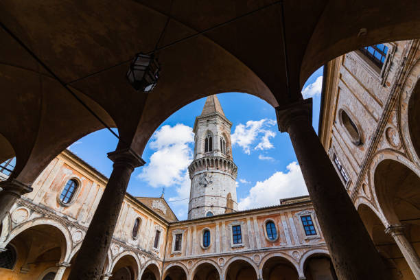 The bell tower seen from the corridor of the Church of St. Peter in Perugia, Italy Perugia is a city located in the Umbria region of central Italy. It is known for its beautiful medieval architecture, rich history, and world-renowned chocolate. church of san pietro photos stock pictures, royalty-free photos & images