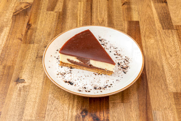 istock A nice piece of industrial cheesecake with chocolate 1488120032