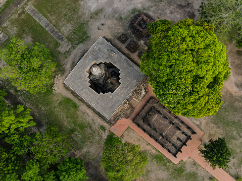 Drone point of view of Buddha in Wat Si Chum, Sukhothai, Thailand