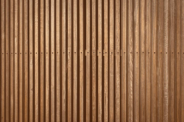 istock wooden strips solid wooden battens wall pattern background with natural color tone  finishing, can be used for background. 1488122990