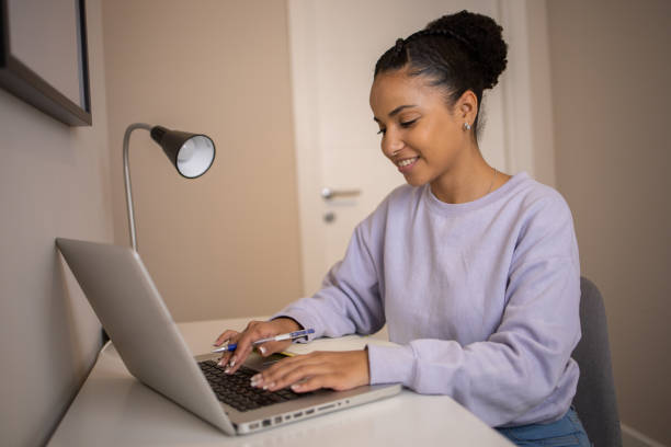 istock Young woman working from home 1488124532