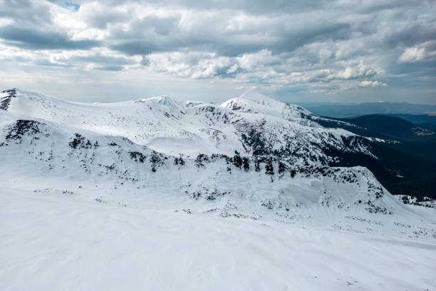 istock A snowy mountains Kizly and Hoverla with a cloudy sky in the background 1488125350