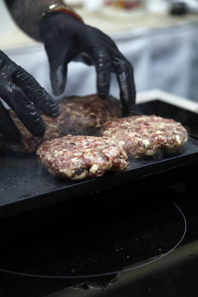 istock gourmet beef burgers being grilled 1488127647
