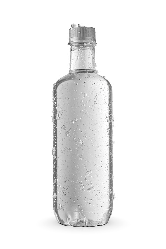 Bottle of purified water without label with ice crystals and droplets isolated on a white background.