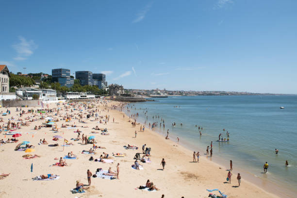 istock Estoril beach full of bathers on a clear summer day 1488131363