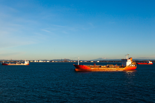 istock Oil tankers anchored in the bay of the seaport of Fos sur Mer in France. 1488136689