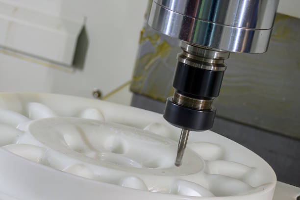 istock The  CNC milling machine cutting the nylon 6 material part with ball end mill tool. 1488136814