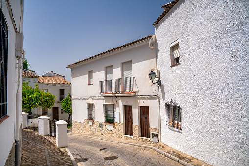 White homes in medieval city streets. Zahara de la Sierra is a Pueblo Blanco.