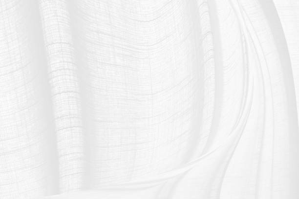 クリーン織られた美しい柔らかい生地の抽象的な滑らかな曲線形状装飾的なファッションテキスタイルの白い背景