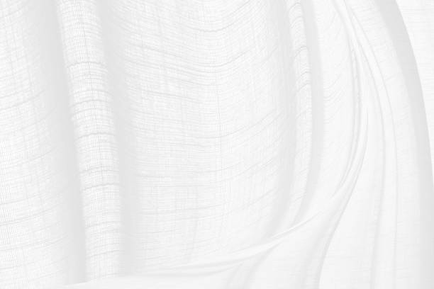 istock Clean woven beautiful soft fabric abstract smooth curve shape decorative fashion textile silver white background 1488140404