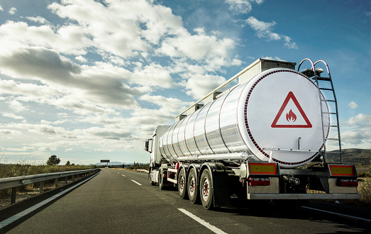 Tanker truck for transporting hazardous chemical materials by road.