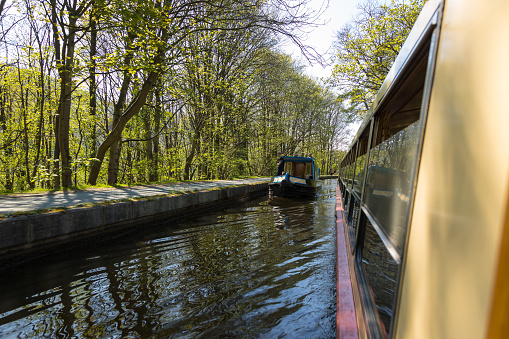 Llangollen, Dengighshire Wales - 21 April 2019: Narrow boats on the Llangollen Canal as it crosses the Pontcysyllte aquaduct, a world heritage site.