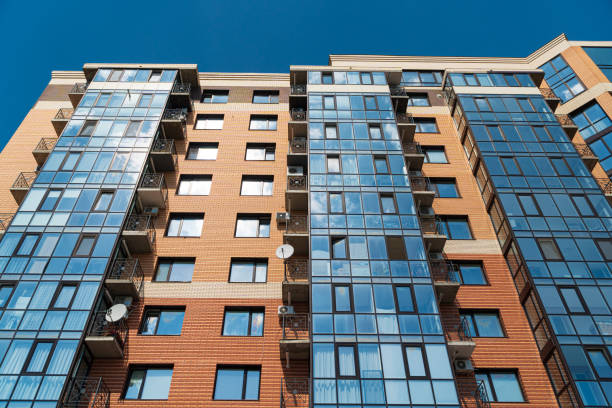 istock Modern apartment buildings on a sunny day with a blue sky 1488149625