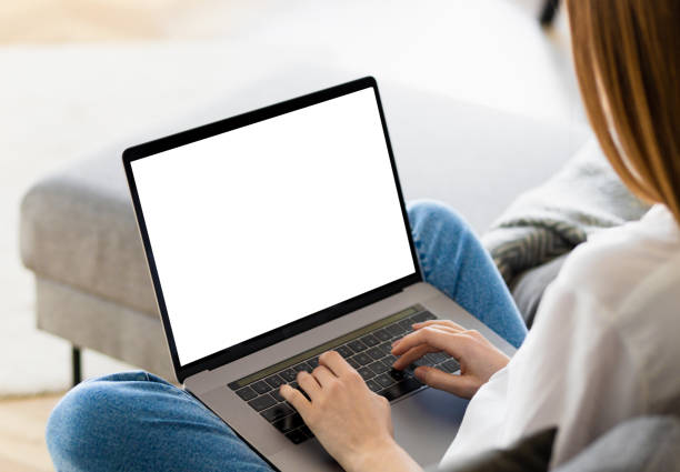 istock woman using laptop with blank screen watching webinar training online works Copy space mock up typing text 1488150462
