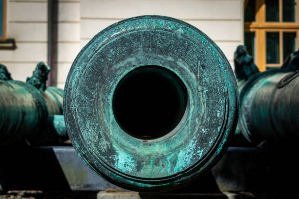 Stockholm, Sweden - August 10, 2022: Closeup view of ancient iron cannon barrel outside the public Army museum in Stockholm Sweden August 10, 2022.